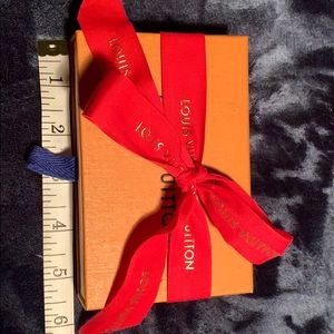 Louis Vuitton empty box with red bow